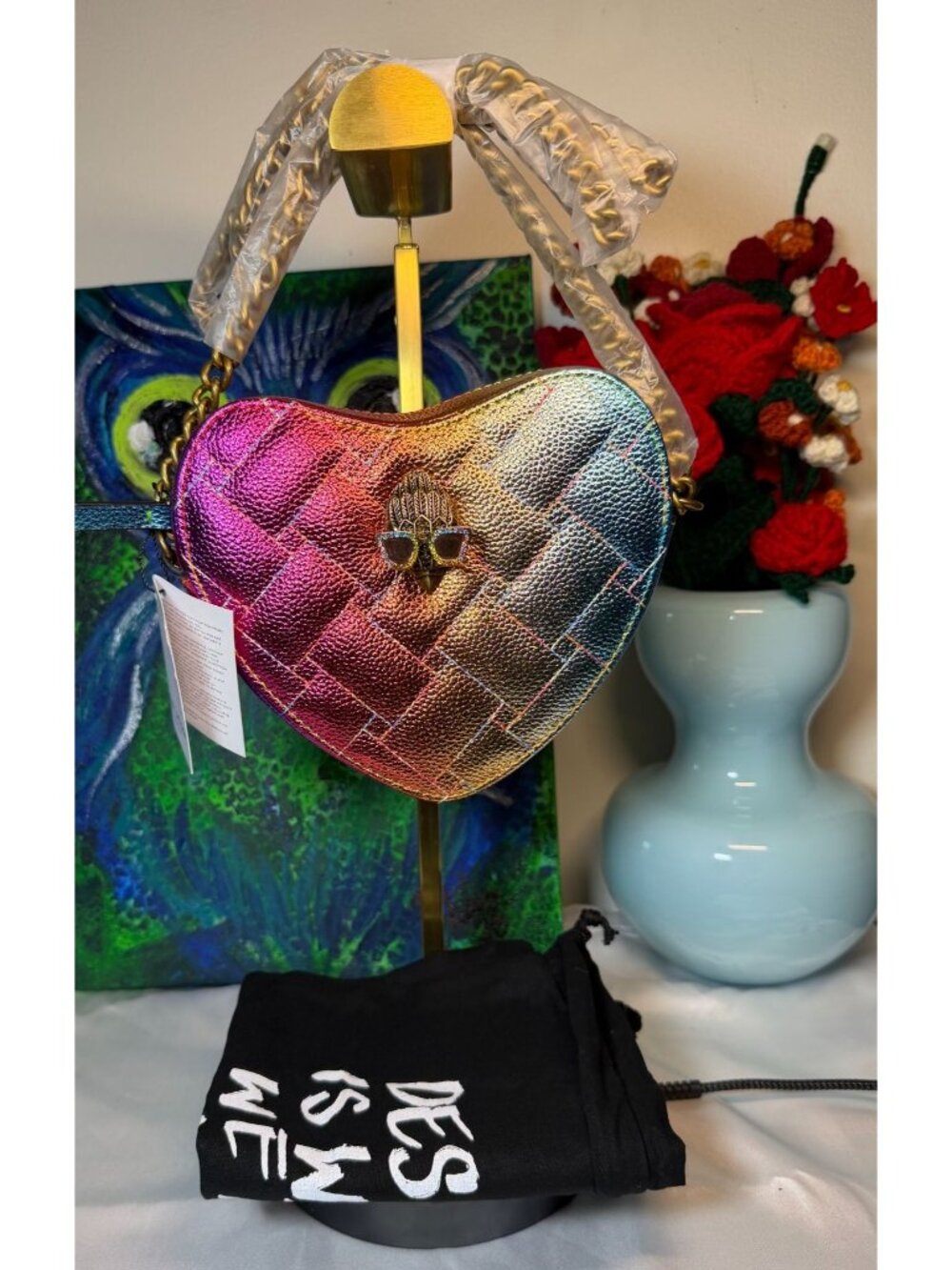 Kurt Geiger Heart-Shaped Metallic Rainbow Crossbody Bag with Eagle wearing Sungl